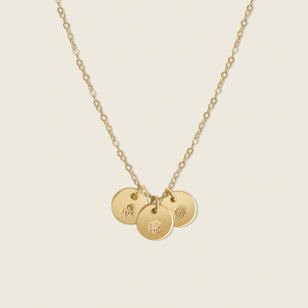 Petite Birth Flower Necklace – a custom, hand-stamped accessory featuring your unique birth flower. Perfect for adding a personal, elegant touch to your everyday style.