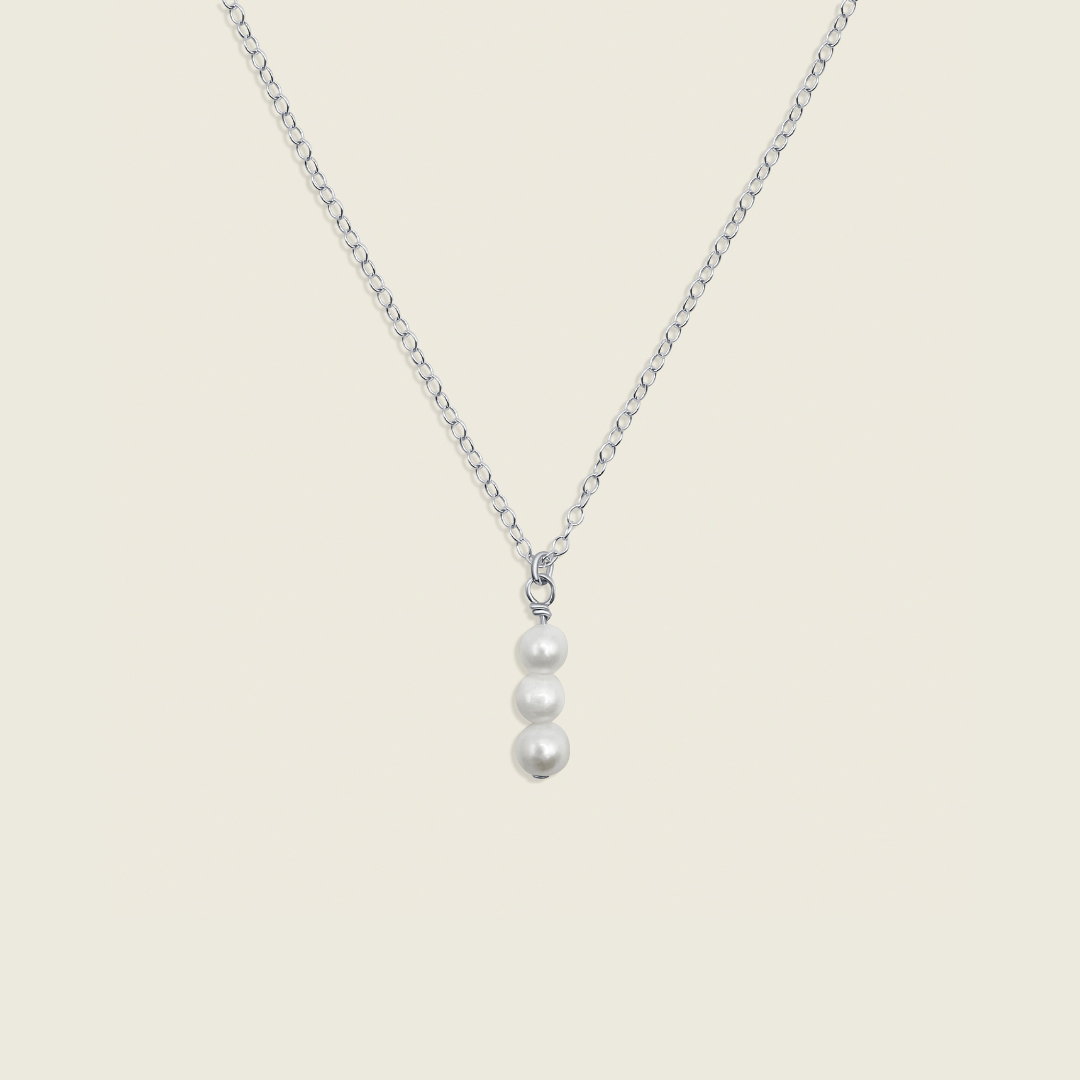 Elegant 3 Pearl Drop Necklace in
Sterling Silver – a timeless, handcrafted jewelry piece perfect for layering and adding sophisticated flair to any outfit.