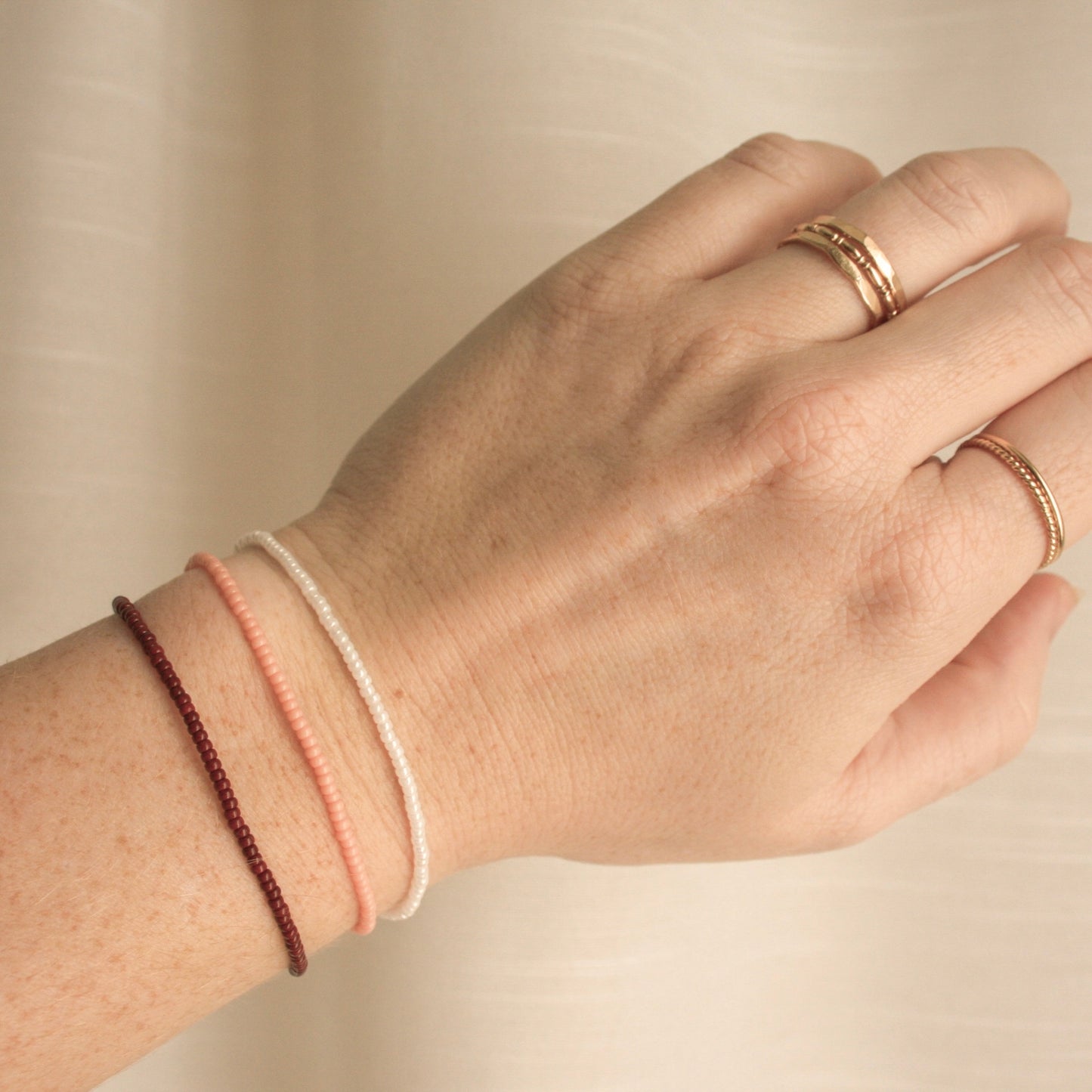 Empowerment Trio Bracelet Stack paired with 14k Gold Filled Stacking Rings