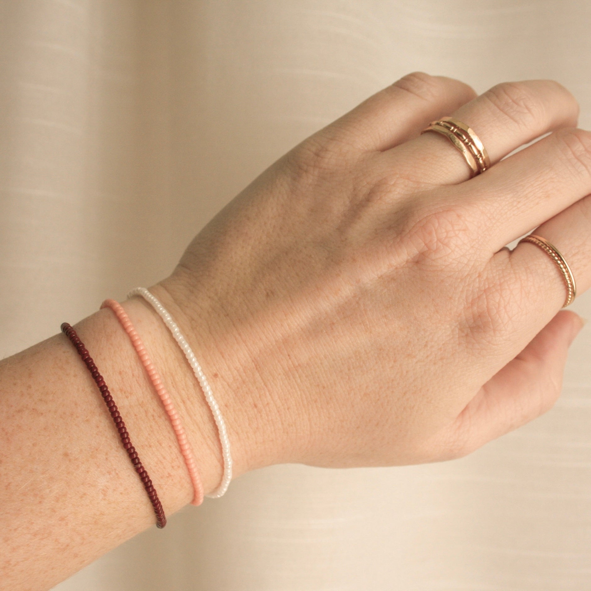 Empowerment Trio Bracelet Stack paired with 14k Gold Filled Stacking Rings