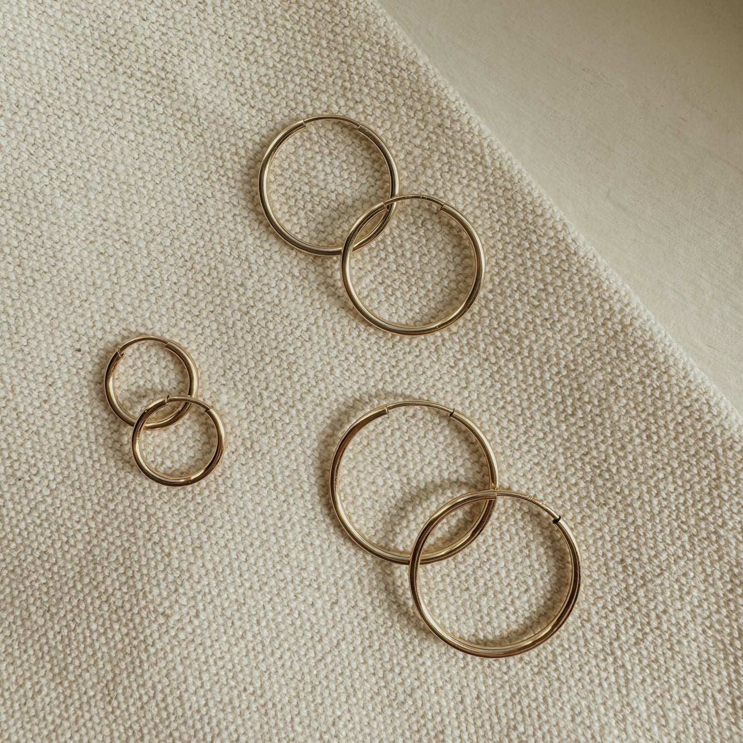 Live In Hoops – 14K Gold Filled: Lightweight, versatile hoop earrings designed for everyday wear. Perfect for adding effortless elegance to any outfit while ensuring all-day comfort.
