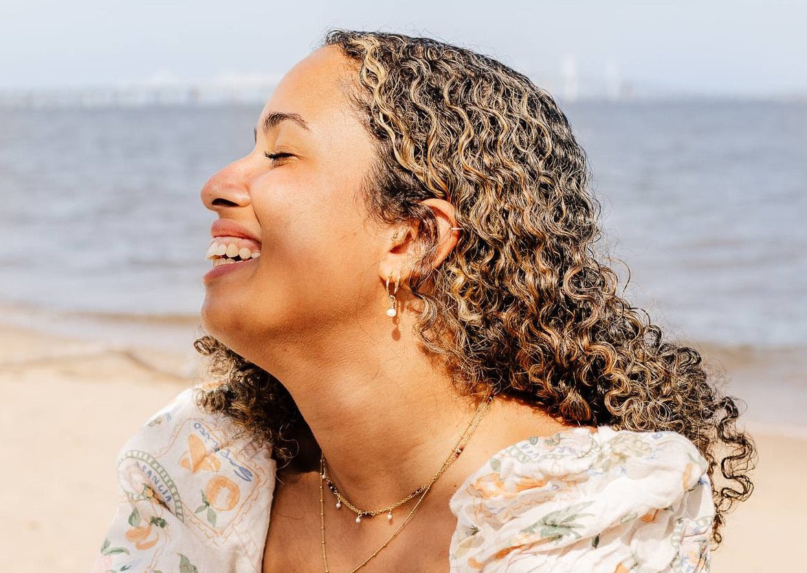 Pearl Charmed Earrings – versatile 2-in-1 hoops featuring elegant pearls, perfect for elevating your everyday style or adding a touch of sophistication to any outfit.