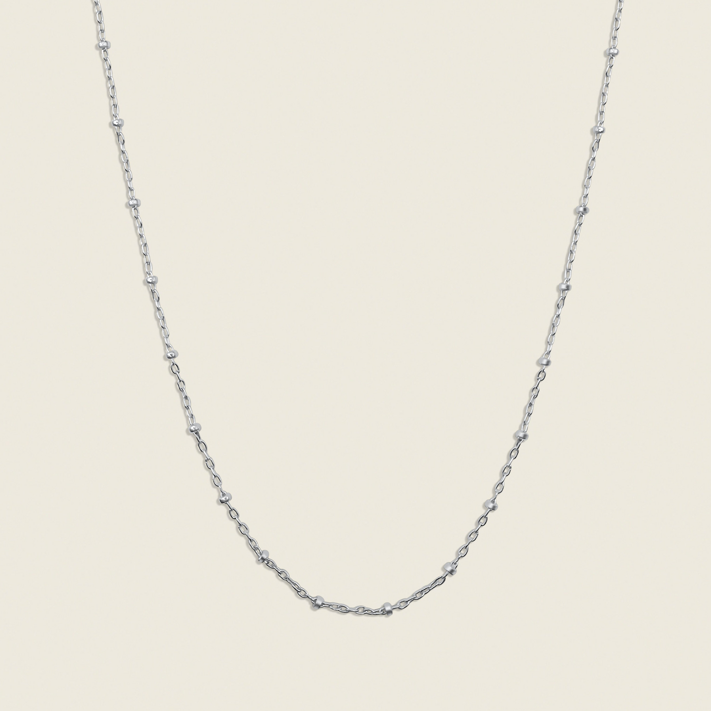 Stars in the Sky Satellite Chain Necklace – a dainty and elegant accessory featuring delicate gold-filled beads on a satellite chain. Perfect for layering or wearing alone to add a subtle celestial sparkle to any look. Shop now for timeless style!