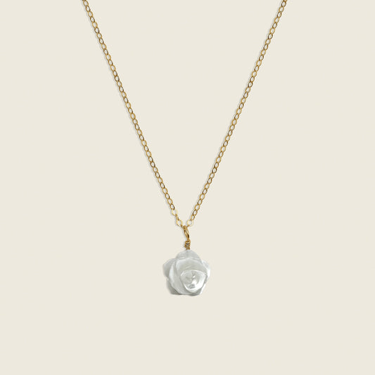 Mother of Pearl Rose Necklace in 14K Gold Filled – a timeless and elegant accessory featuring a delicate mother of pearl rose charm. Perfect for adding a touch of sophistication and femininity to your style. Shop this handcrafted necklace today