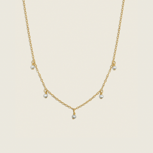 Timeless Pearl Necklace – handcrafted with genuine freshwater pearls and a 14K gold-filled chain. A classic, elegant accessory perfect for any occasion. Shop now for a timeless jewelry piece!