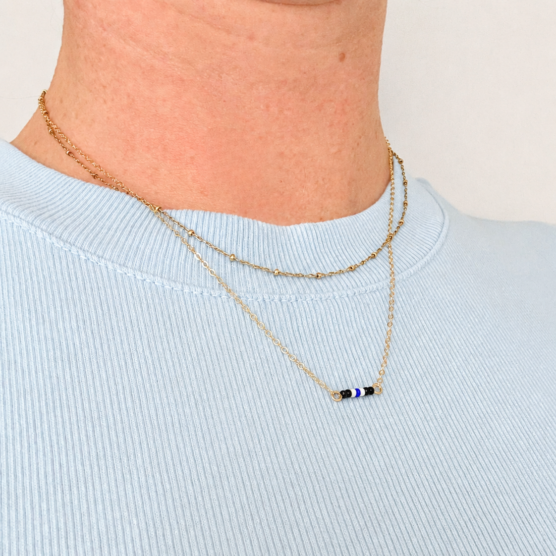 petite police necklace with stars in the sky necklace