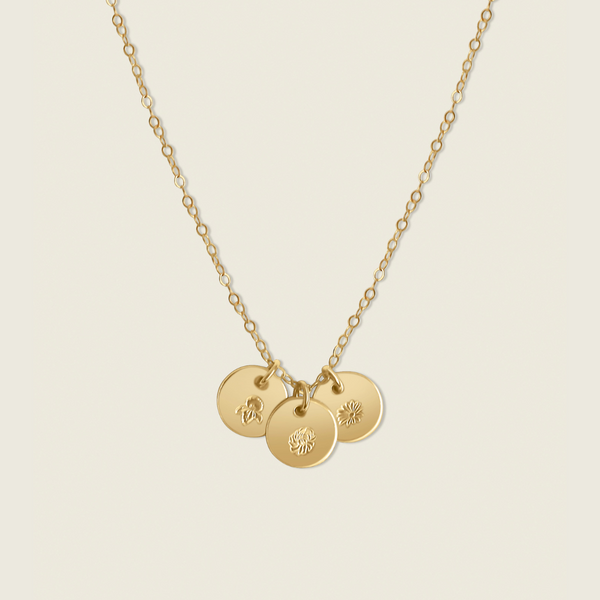 Petite Birth Flower Necklace – a custom, hand-stamped accessory featuring your unique birth flower. Perfect for adding a personal, elegant touch to your everyday style.