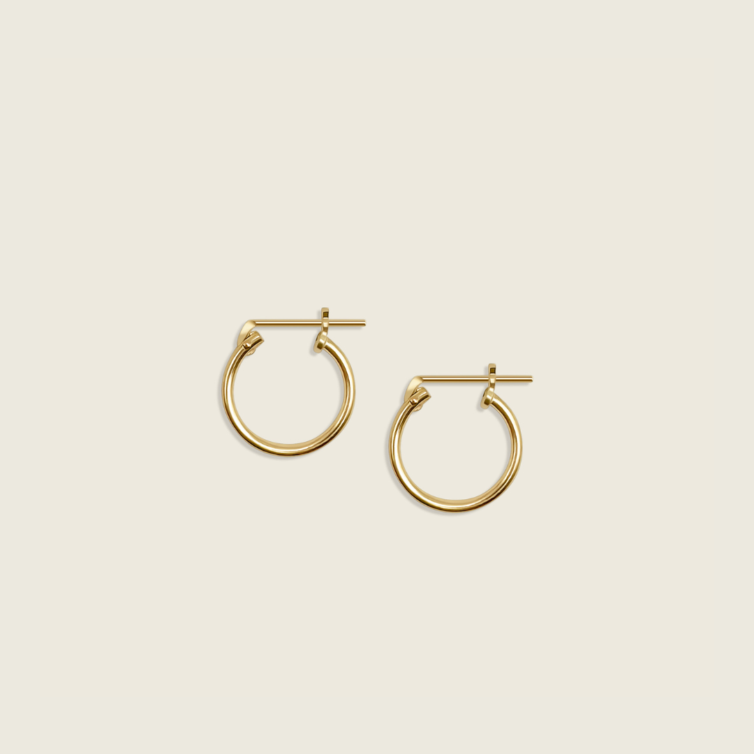 Charmed Earrings in 14K Gold Filled – a delicate and versatile accessory that adds a touch of enchantment to every outfit.