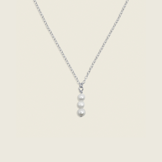 Elegant 3 Pearl Drop Necklace in 
Sterling Silver – a timeless, handcrafted jewelry piece perfect for layering and adding sophisticated flair to any outfit.