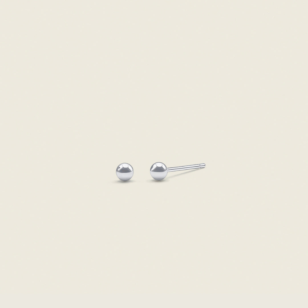 Petite Classic Ball Earrings – dainty, minimal stud earrings perfect for everyday wear. These versatile ball earrings add a touch of effortless elegance to any look.