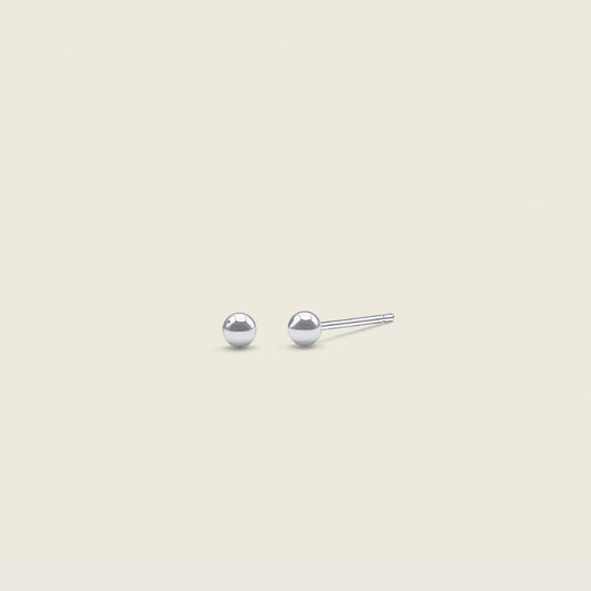 Petite Classic Ball Earrings – dainty, minimal stud earrings perfect for everyday wear. These versatile ball earrings add a touch of effortless elegance to any look.