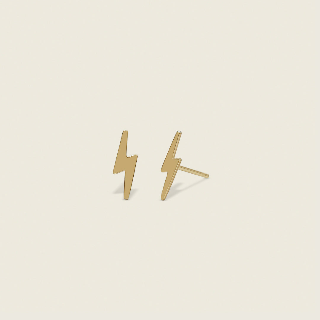 Lightning Bolt Stud Earrings – Bold, edgy statement accessory featuring a sleek lightning bolt design, perfect for adding modern flair to your look. Shop these standout pieces for a dynamic, trendsetting style.