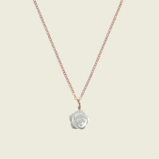 Mother of Pearl Rose Necklace in 14K Rose Gold Filled – a timeless and elegant accessory featuring a delicate mother of pearl rose charm. Perfect for adding a touch of sophistication and femininity to your style. Shop this handcrafted necklace today