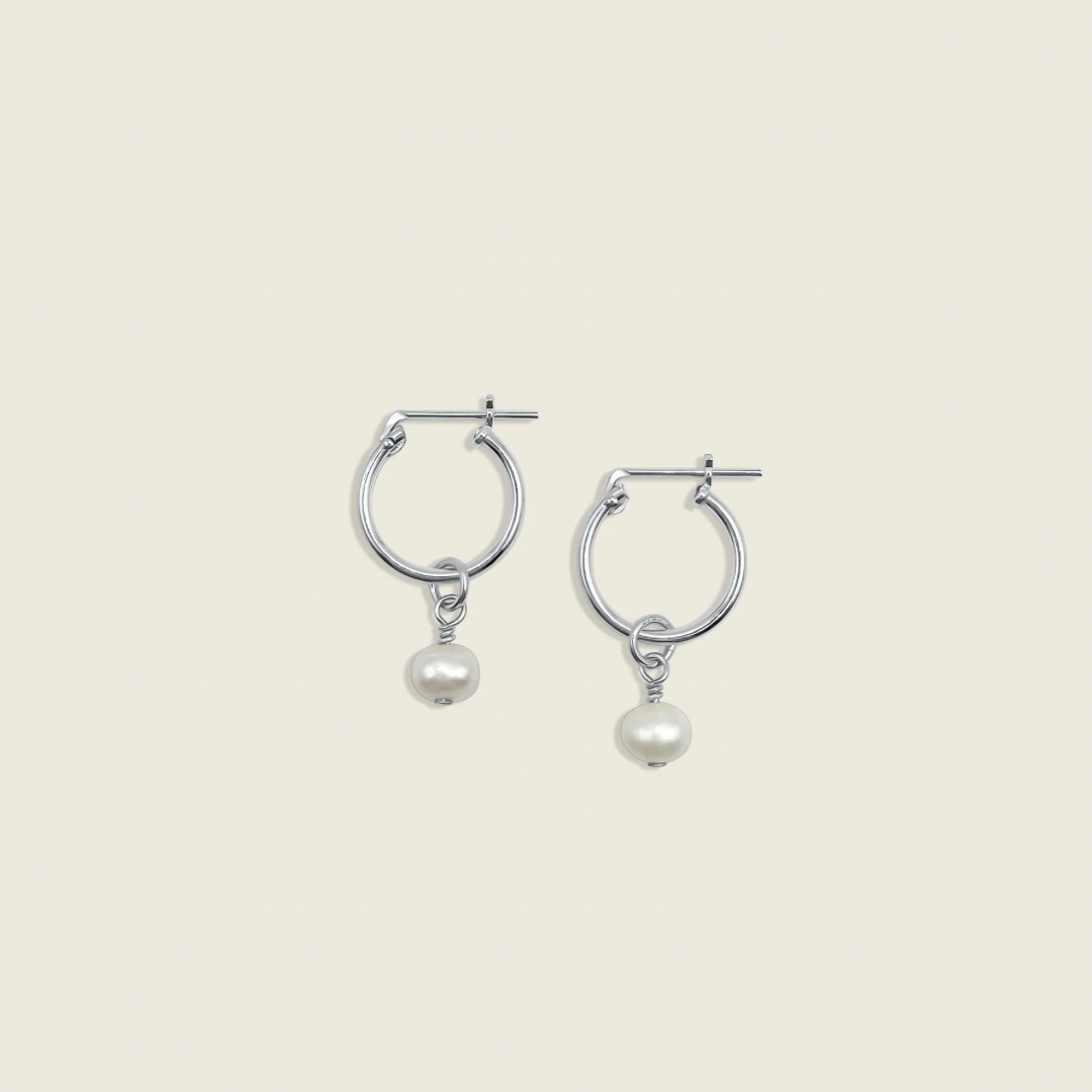 Pearl Charmed Earrings – versatile 2-in-1 hoops featuring elegant pearls, perfect for elevating your everyday style or adding a touch of sophistication to any outfit.