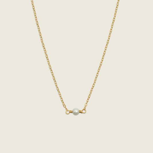 Petite Single Pearl Necklace – a dainty, minimal accessory featuring a stunning freshwater pearl. Perfect for adding a touch of elegance to your everyday style.