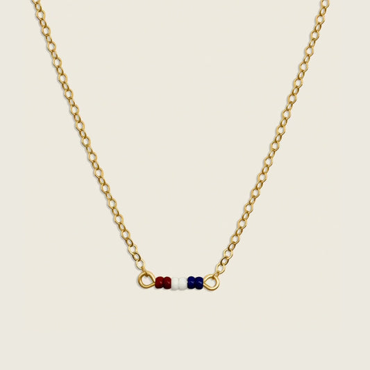 Petite Stars and Stripes Necklace – a meaningful accessory designed to show support for the military and honor those deployed. Perfect for wearing every day as a symbol of pride and patriotism.