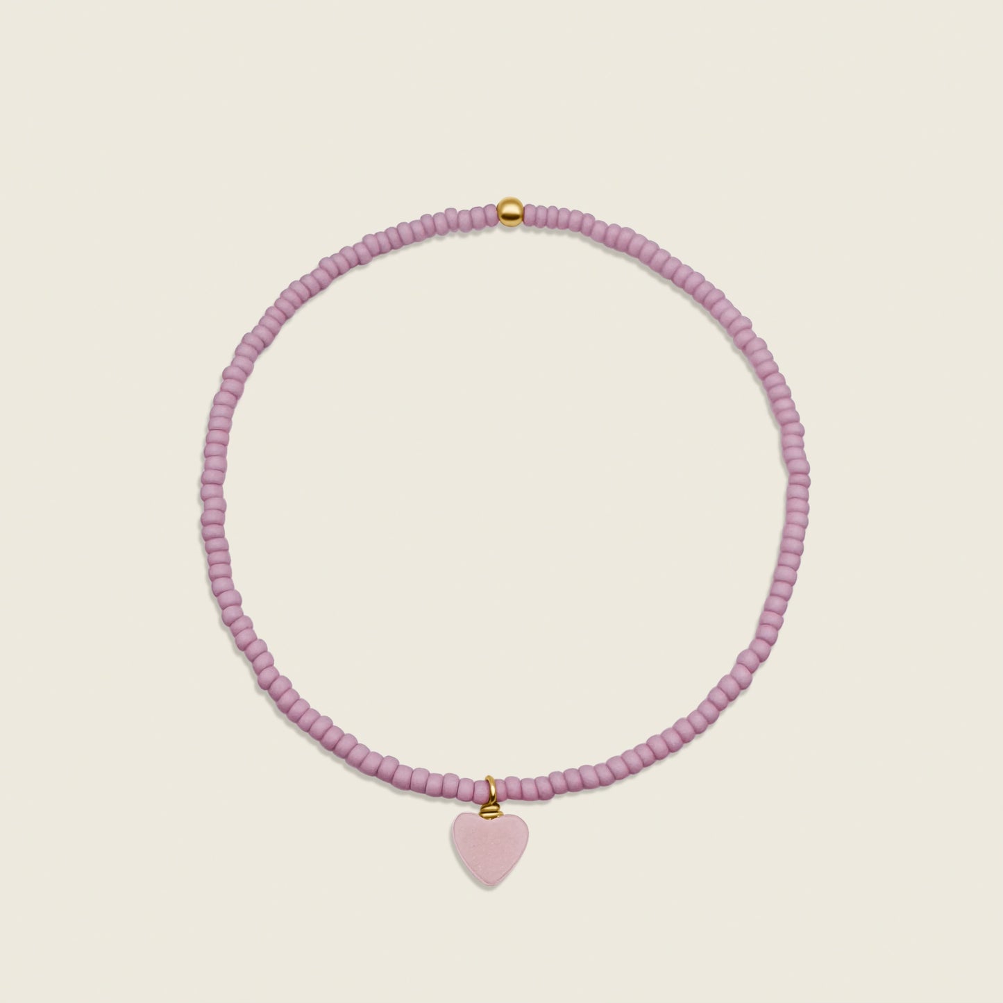 Pink Heart Charm Bracelet – featuring rose quartz and a delicate pink heart charm, this elegant accessory symbolizes love and emotional healing. Perfect for adding a touch of rosy charm to your jewelry collection.