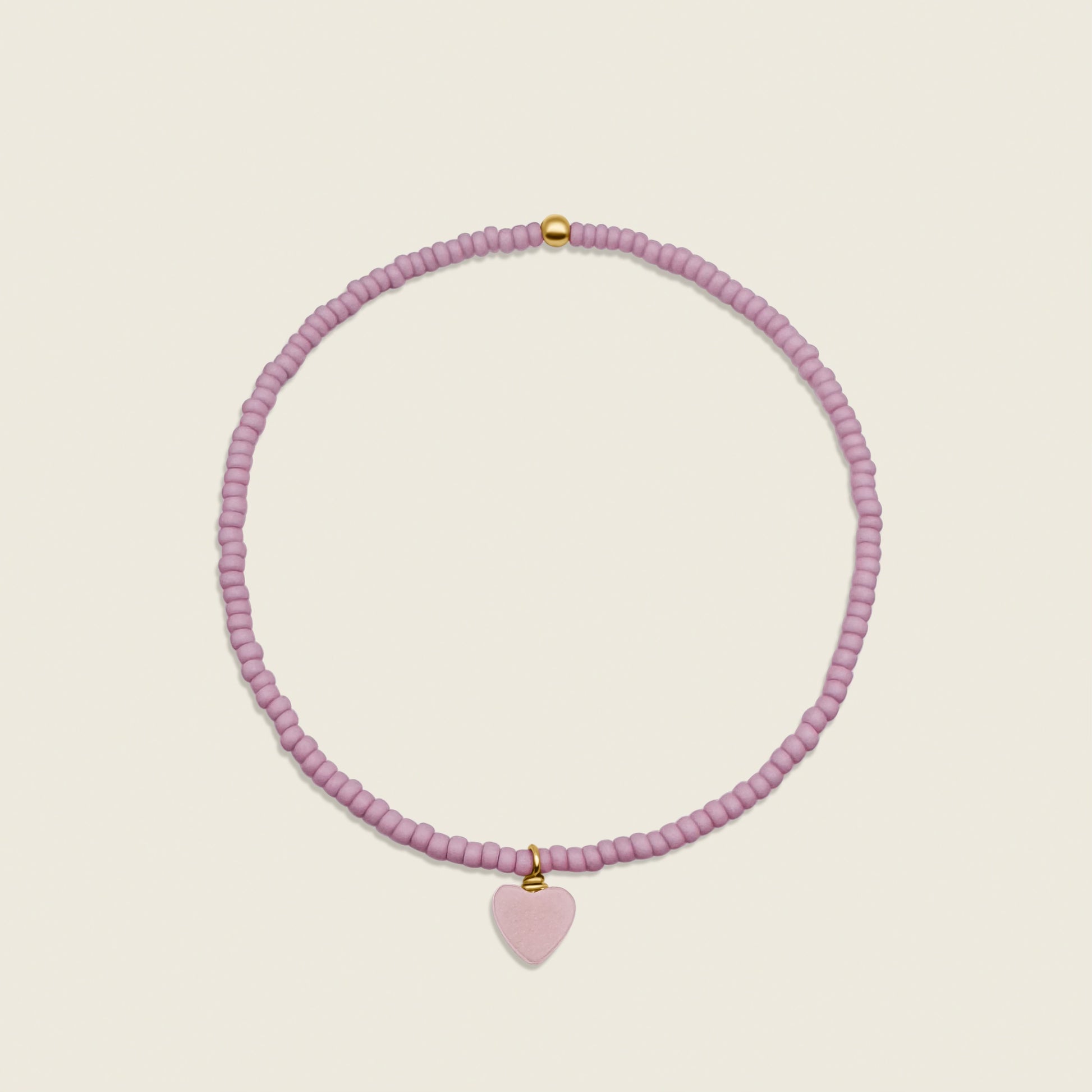 Pink Heart Charm Bracelet – featuring rose quartz and a delicate pink heart charm, this elegant accessory symbolizes love and emotional healing. Perfect for adding a touch of rosy charm to your jewelry collection.