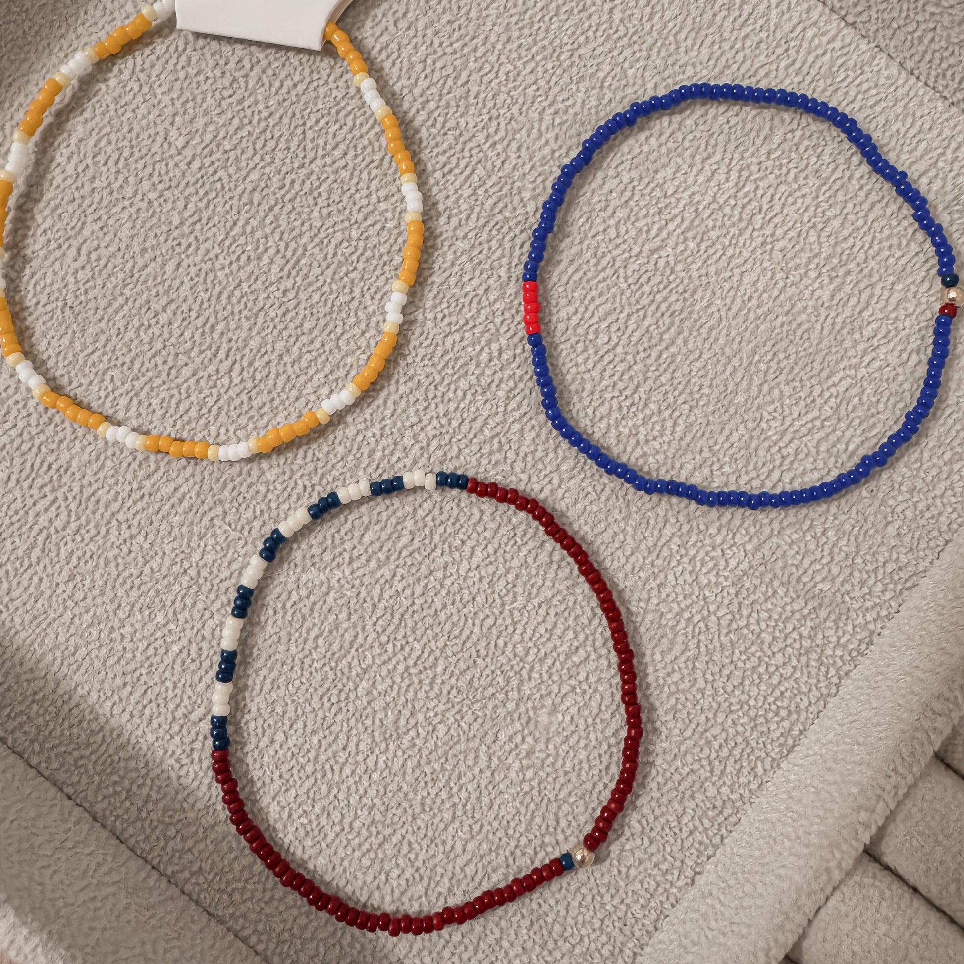 Stars and Stripes Beaded Bracelet – a patriotic accessory featuring red, white, and blue beads, perfect for showing your American pride. 