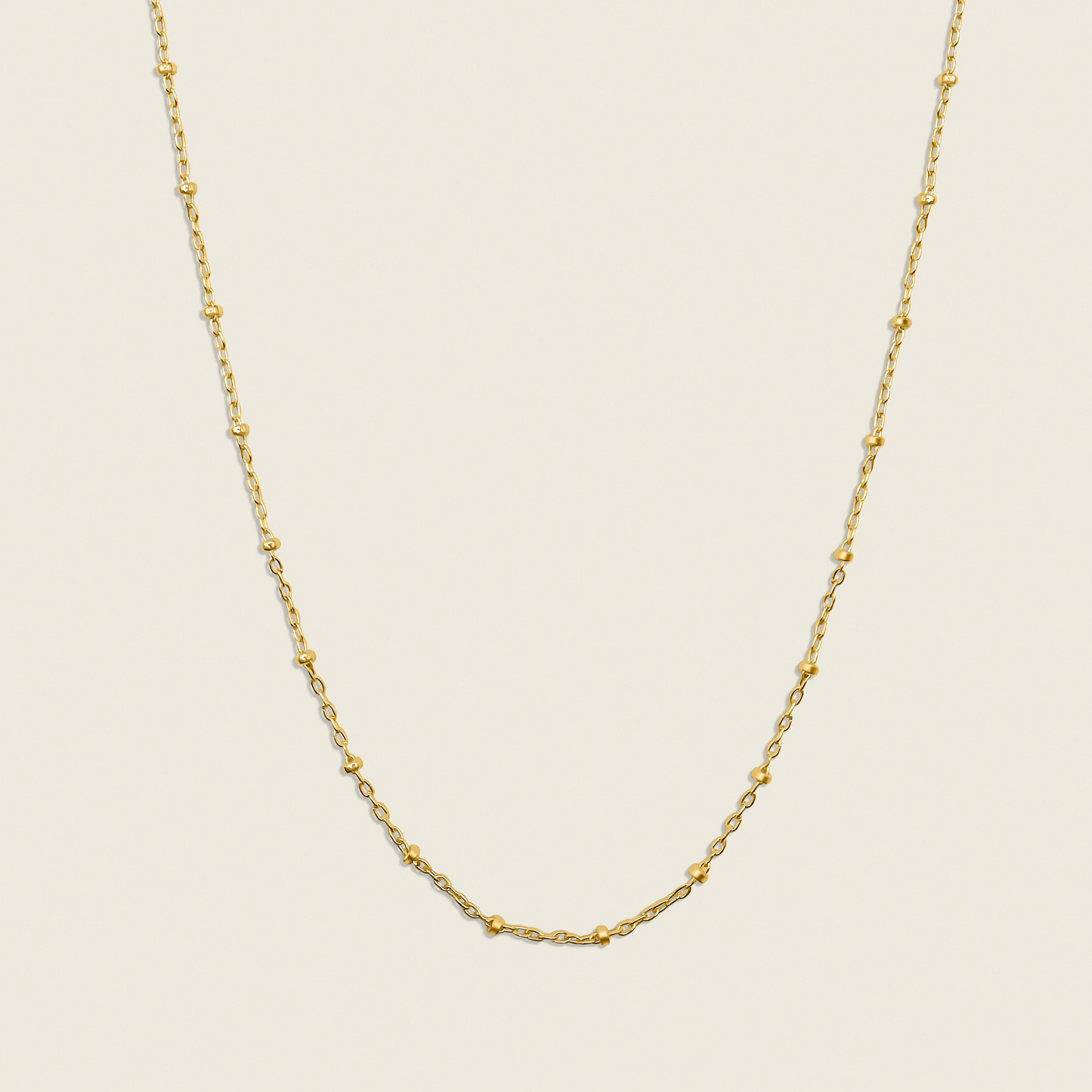 Stars in the Sky Satellite Chain Necklace – a dainty and elegant accessory featuring delicate gold-filled beads on a satellite chain. Perfect for layering or wearing alone to add a subtle celestial sparkle to any look. Shop now for timeless style!