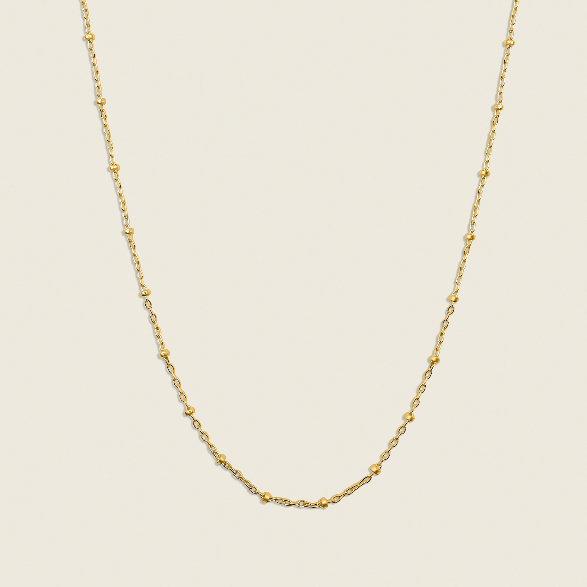 Stars in the Sky Satellite Chain Necklace – a dainty and elegant accessory featuring delicate gold-filled beads on a satellite chain. Perfect for layering or wearing alone to add a subtle celestial sparkle to any look. Shop now for timeless style!