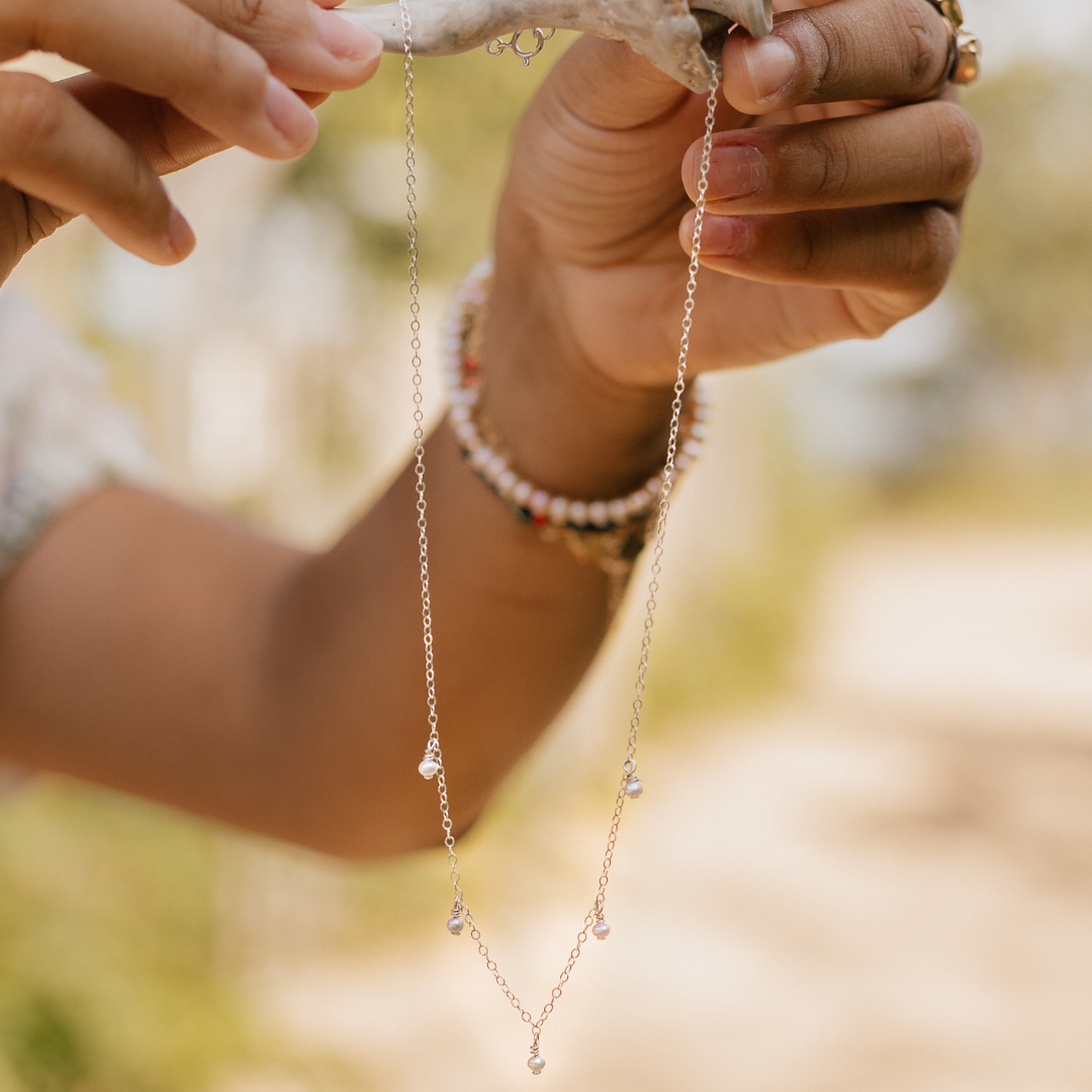 Timeless Pearl Necklace – handcrafted with genuine freshwater pearls and a 14K gold-filled chain. A classic, elegant accessory perfect for any occasion. Shop now for a timeless jewelry piece!