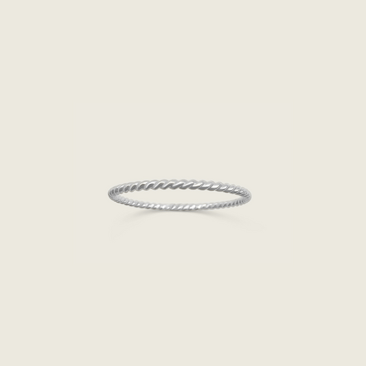 Twisted Ring – Handmade in Sterling Silver, featuring a unique and elegant twisted design. Perfect for stacking or wearing alone, this timeless piece adds a touch of sophistication to any jewelry collection.