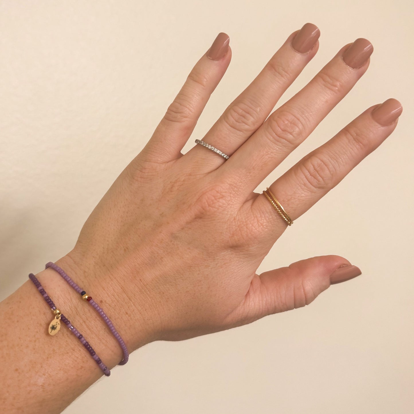 bloom bracelet with dandelion charm to represent month of the military child