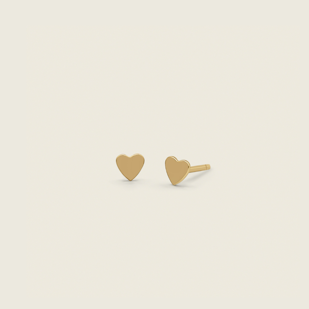 dainty heart stud earrings in 14k gold filled product photo and come with butterfly backings - minimal for everyday wear