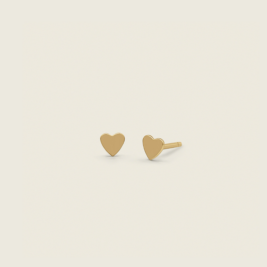 dainty heart stud earrings in 14k gold filled product photo and come with butterfly backings - minimal for everyday wear